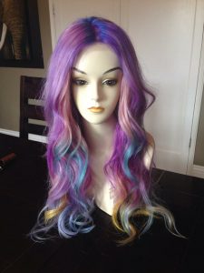 Gardea's first wig, the unicorn rainbow wig.